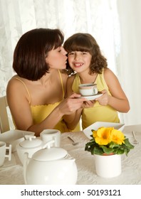 Little Girl Serving Coffee For Mother's Day Breakfast