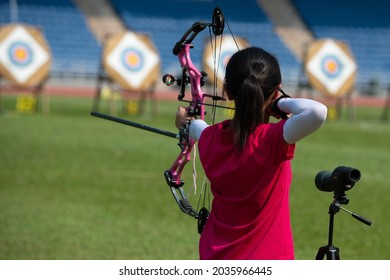 Little Girl Shoot At Archery Competition