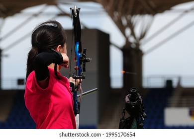 Little Girl Shoot At Outdoor Archery Competition