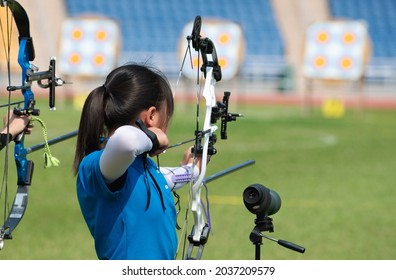 Little Girl Shoot At Outdoor Archery Competition