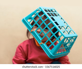 Little Girl Shopping With Cart. Little Girl With Shopping Basket Over Her Head, Playing To Go To The Mall. Happy Smiling Child Over In Trolley Cart. Sales And Shopping.