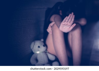 Little girl showing hand signaling to stop useful to campaign against violence and pain. Concept of Stop abusing child violence