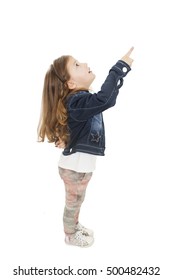 Little Girl Showing Something Above Her, Isolated On White Background