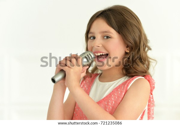 Little Girl Singing Microphone Stock Photo 721235086 | Shutterstock