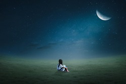 The Little Girl Sits In A Lawn In The Moonlight In Half-lonely Half Moon.