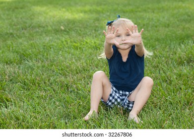 Little Girl Sitting Grass Holding Hands Stock Photo 32267806 | Shutterstock