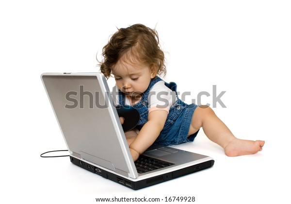 Little Girl Sitting On Laptopwith Cd Stock Photo Edit Now 16749928
