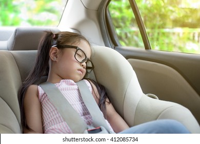 Little Girl Sleeping In Child Car Seat
