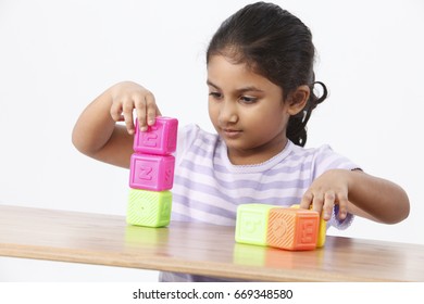 Little Girl Stacking Abc Blocks Stock Photo 669348580 Shutterstock Little Girl Stacking Abc Blocks Stock Photo 669348580 Shutterstock