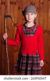 Little Girl Standing And Shepherd Holding A Shepherd's Staff. Farm