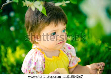 Similar – beautiful baby looking very funny into the the camera