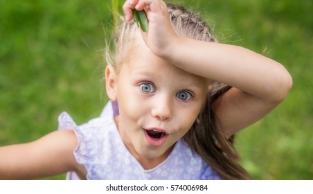 Little Girl Surprised And Delighted, Close-up