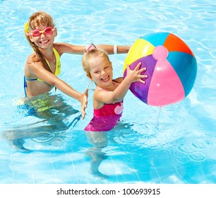 Little Girl  Swimming In Pool.