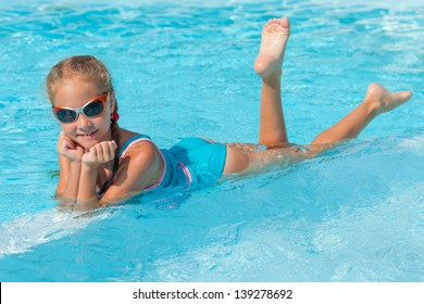 Little Girl In The Swimming Pool