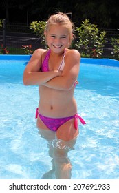 Little Girl In The Swimming Pool