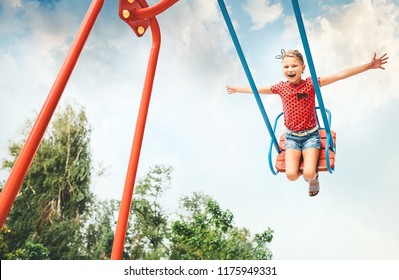 Little Girl Swing On Swing