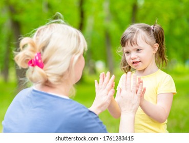 Little Girl Syndrome Down Talks Her Stock Photo (Edit Now) 1789519349