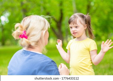 Little Girl Syndrome Down Talks Her Stock Photo (Edit Now) 1789519349