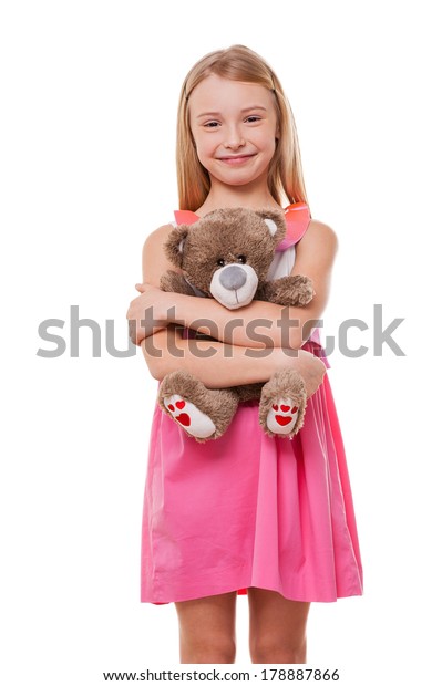 little girl with a teddy bear