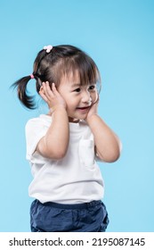 Little girl touch her face - Shutterstock ID 2195087145