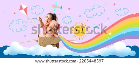 Little girl with toy and cardboard airplane flying in drawn sky