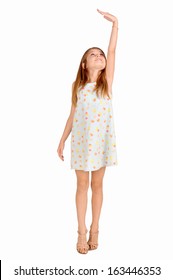 Little Girl Trying To Be Taller Isolated In White