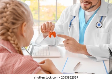 Little Girl Visiting Endocrinologist In Clinic