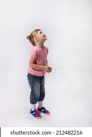 Little Girl Waiting Something And Looking Up, White Background