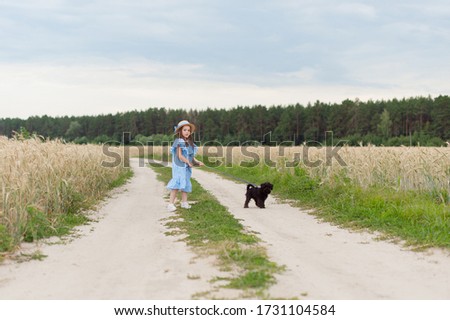 Similar – Attractive smiling blond woman with her two dogs