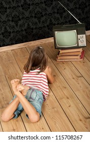 Little Girl Watching Old Retro Tv