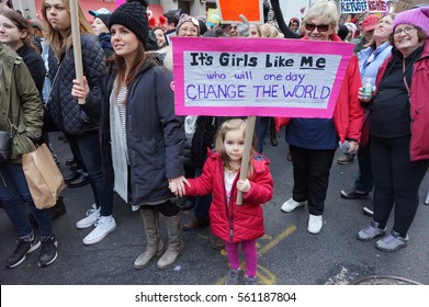 Little Girl Waving Sign at Women's March Trump Protest in New York on January 21, 2017
