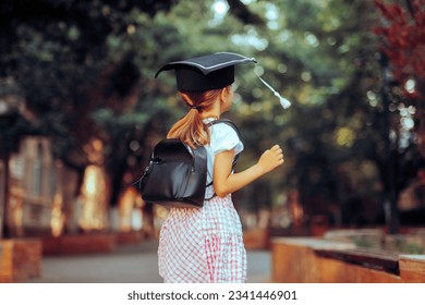 
Little Girl Wearing a School Bag and a Mortarboard. Happy cheerful child graduating from preschool
 - Powered by Shutterstock