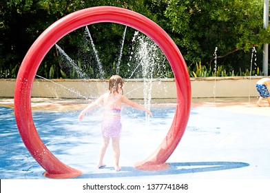 Little Girl Wet At Splash Pad