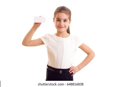 Little Girl In White T-shirt Holding White Card