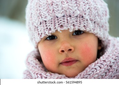 Little Girl In Winter Season With Red Cheeks