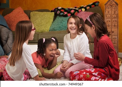 Little Girls At A Sleepover Laugh Together