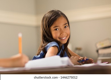 Little Girls Working On School Work