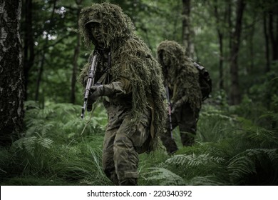 Little Green Men During Patrol In Forest