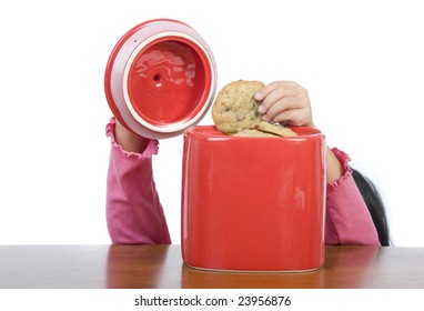 A Little Hand Reaching Into The Cookie Jar.