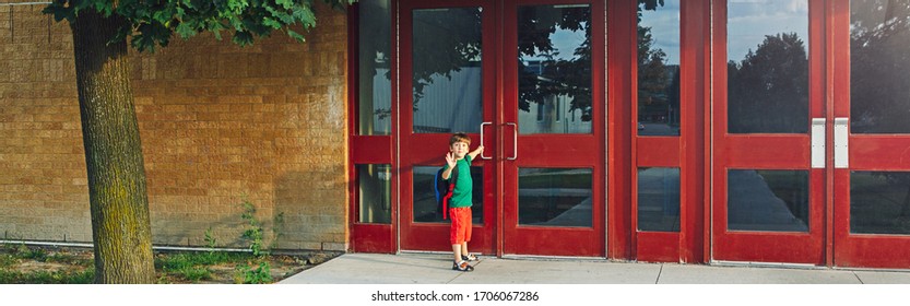 Little Happy Caucasian Boy Student With Backpack Waving Hand Farewell. Kid Opening Door On 1 September Day. Education Back To School. Child Ready To Learn, Study. Web Banner Header For Website.