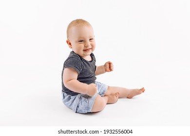 Little Happy Cute Boy, Kid Is Played On Isolated White Background