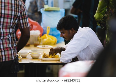 Little India, Singapore - December 25, 2015: One Indian Man Having Lunch At The Hawker Centre Inside The Tekka Centre, Little India, Singapore.