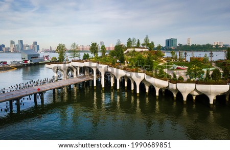 Little Island park at Pier 55 in New York, an artificial island park in the Hudson River west of Manhattan in New York City, adjoining Hudson River Park aerial view