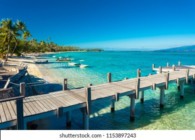 Little Jetty And Boat On Tropical Beach With Amazing Water, Moorea, Tahiti