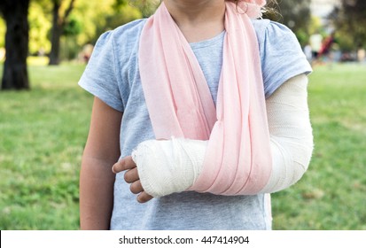 Little Kid With Broken Hand And Cast,selective Focus