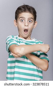 Little Kid With A Bruised Elbow