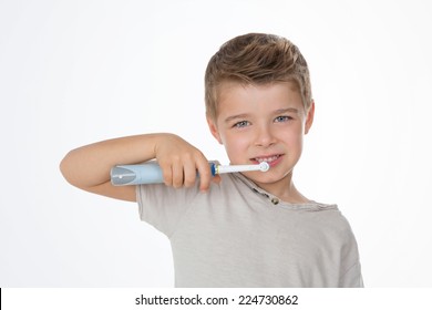 Little Kid Cleans His Teeth With Electric Toothbrush