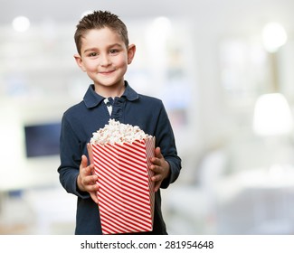 Little Kid Eating Popcorn