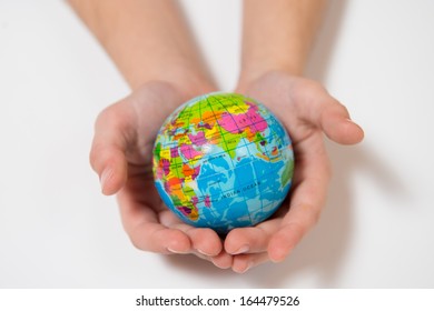 Little Kid Hands  Holding World Globe Isolated On White Background