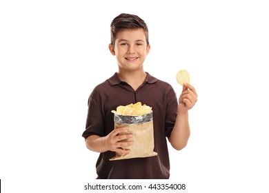 Little Kid Holding A Bag Of Potato Chips In On E Hand And A Single Chip In The Other Isolated On White Background